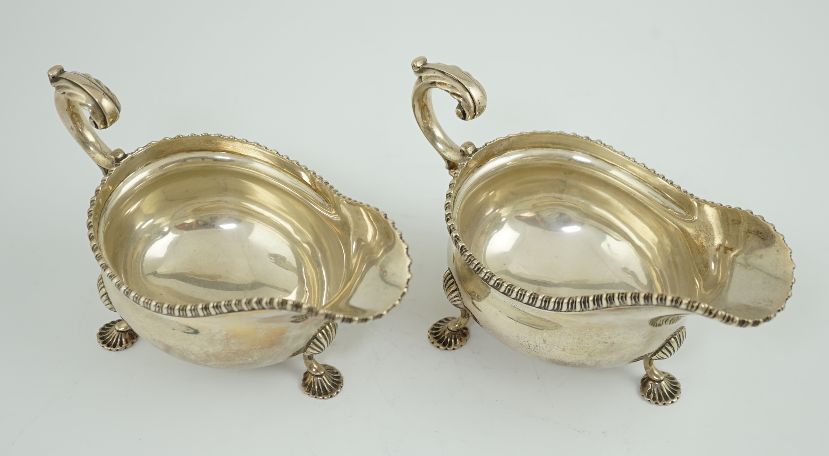 A pair of Edwardian silver sauce boats, by Goldsmiths & Silversmiths Co Ltd